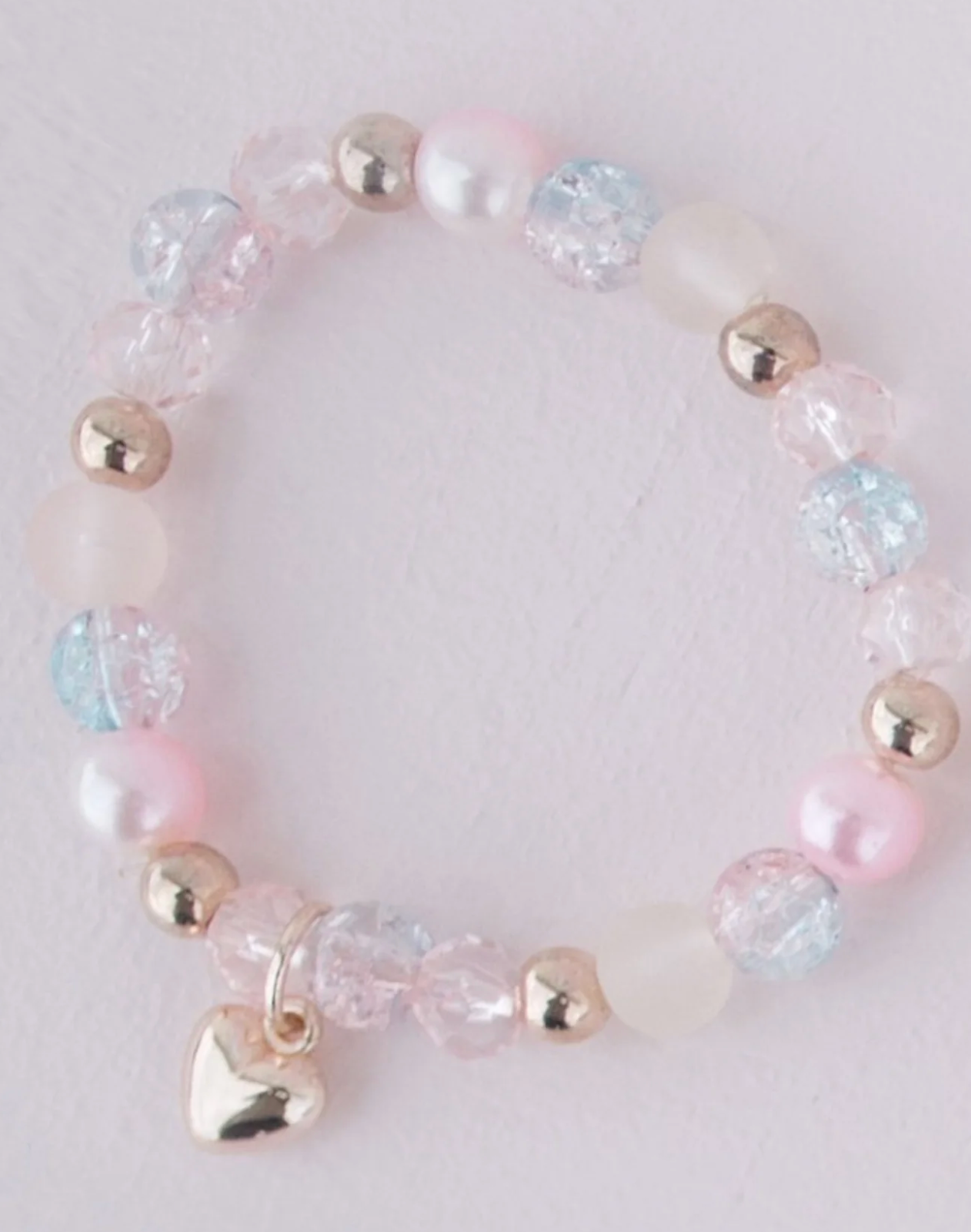 Great Pretenders boutique sweet heart bracelet, colorful accessory with heart-shaped charms and playful design for kids.