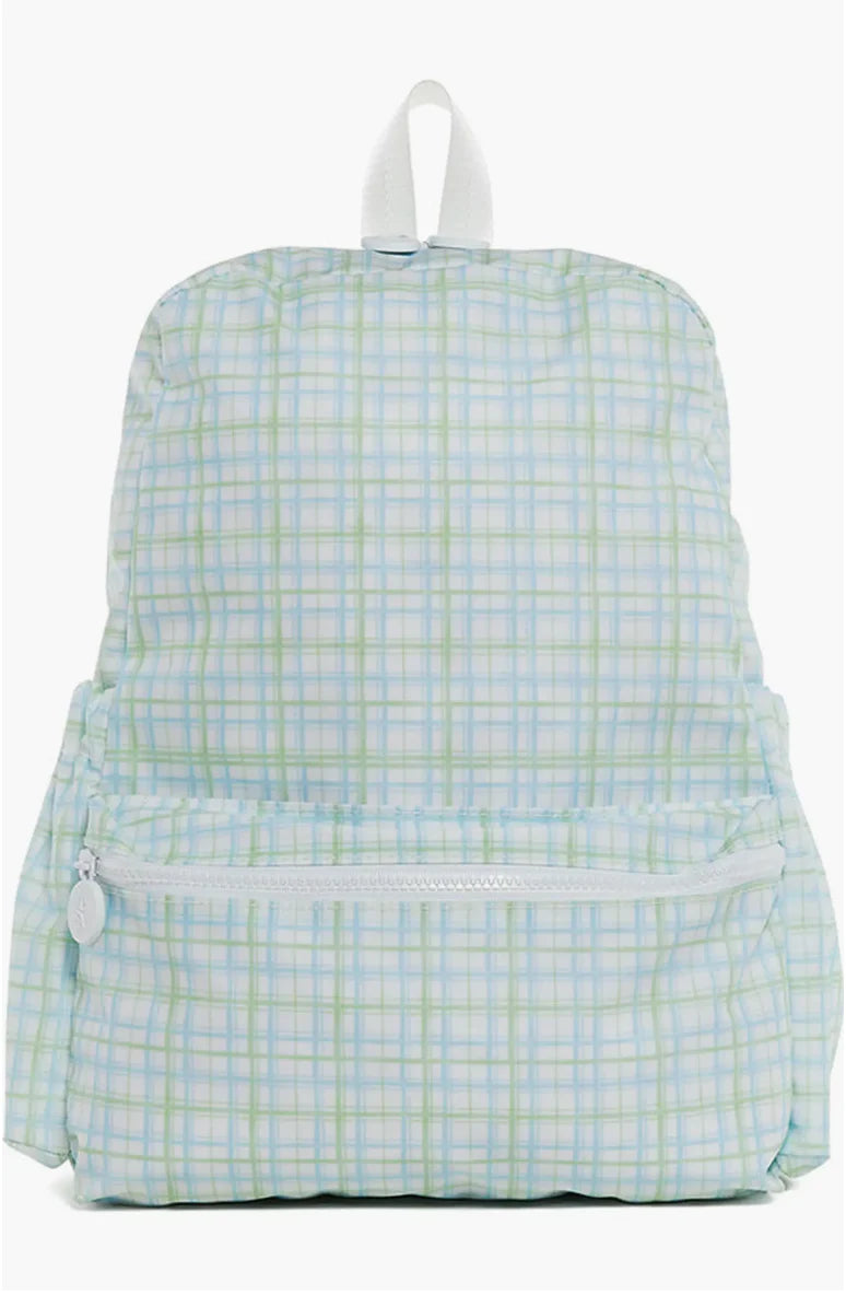 TRVL Design backpack with multiple compartments, black color, and adjustable straps, suitable for travel and everyday use.