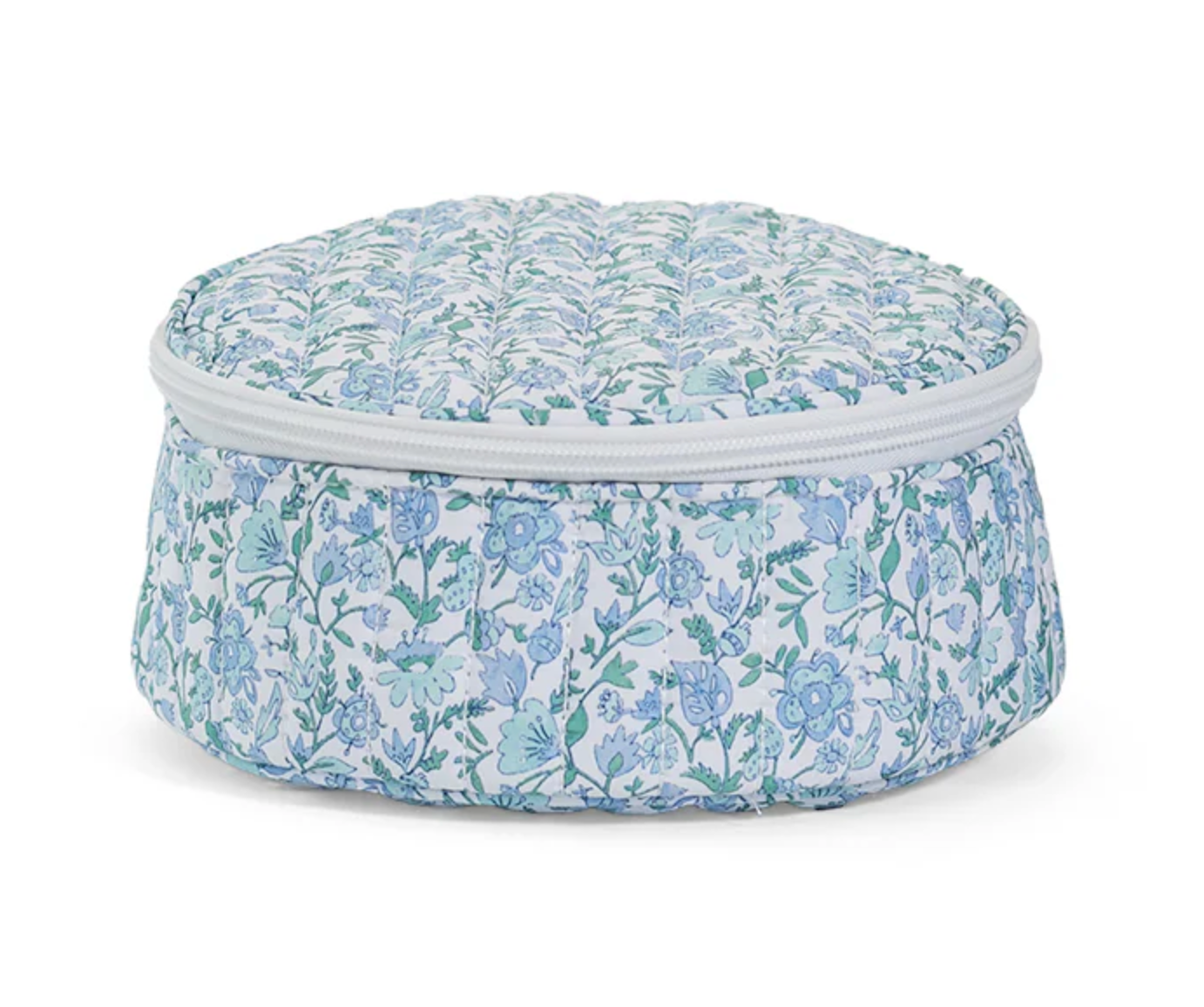 Close-up of a quilted jewel round pillow by TRVL Designs featuring intricate quilting and a vibrant jewel tone fabric.