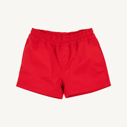 Richmond Red Sheffield shorts by The Beaufort Bonnet Company featuring multicolor stork pattern on beige fabric.