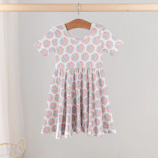 Nola Tawk Shell Yeah! organic cotton dress in shell print, showcasing lightweight fabric and casual fit on a model.