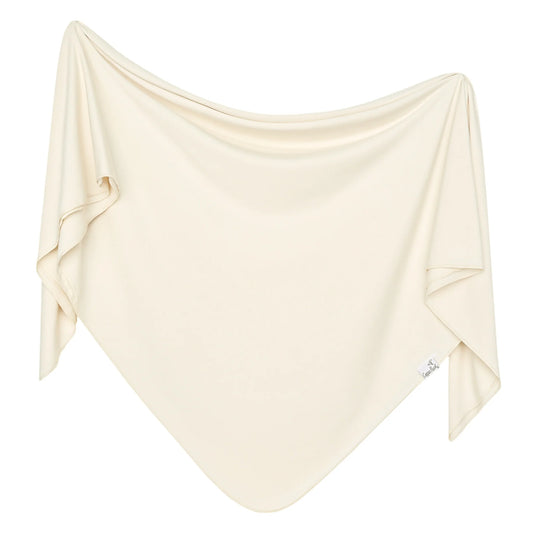 Copper Pearl Cru Knit Swaddle Blanket with soft, textured knit fabric, perfect for wrapping and soothing a baby.