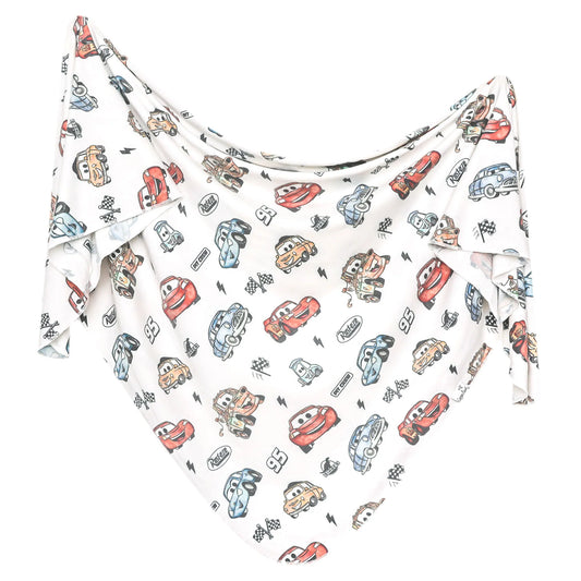 Pink Disney Pixar Cars knit swaddle blanket by Copper Pearl featuring colorful cartoon cars and soft, cozy fabric for babies.