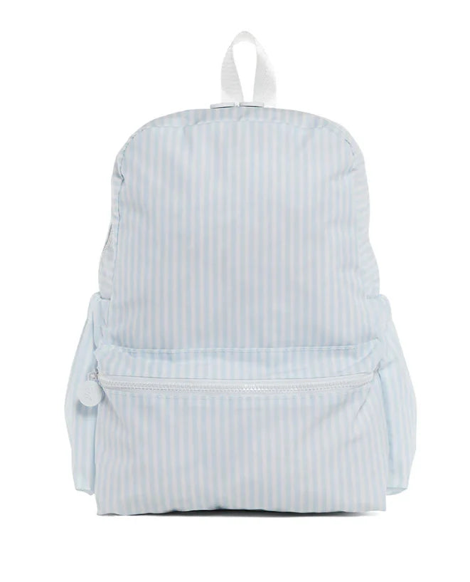 Blue TRVL Designs backpack with Pimlico stripe pattern, featuring multiple compartments and adjustable straps for travel and everyday use.