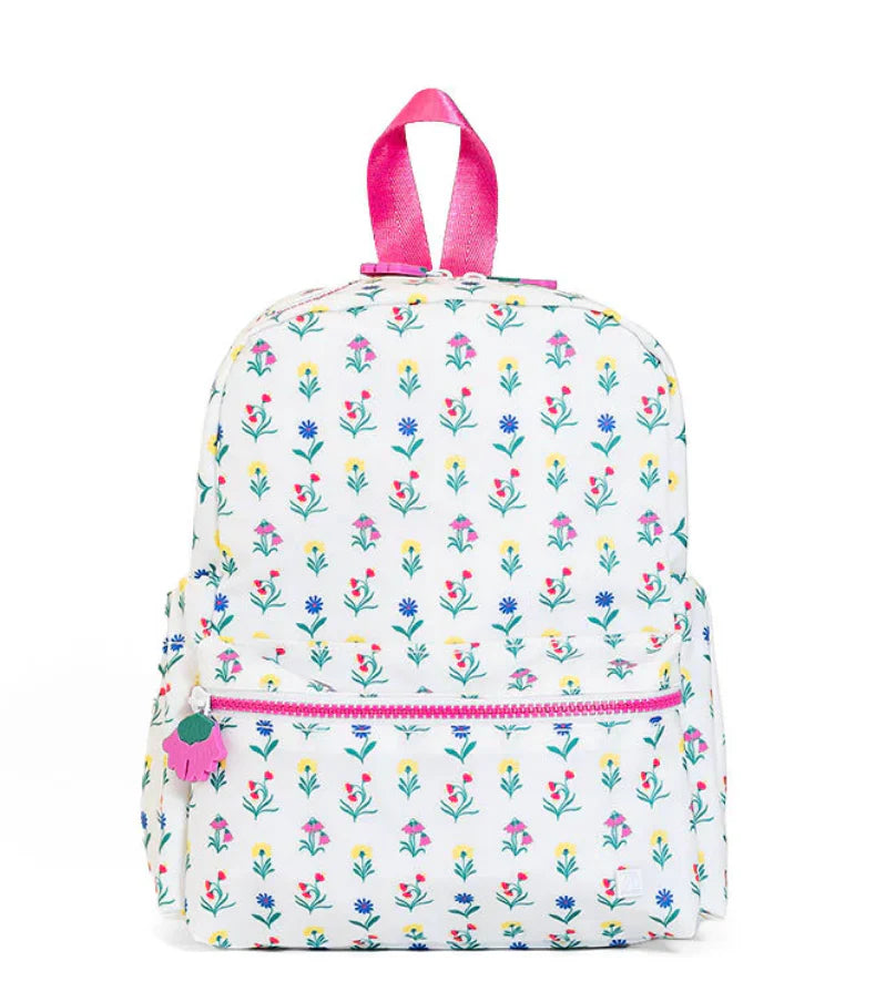 TRVL Designs Mini Backer with vibrant wildflower pattern, featuring colorful floral artwork on a small fabric backing.