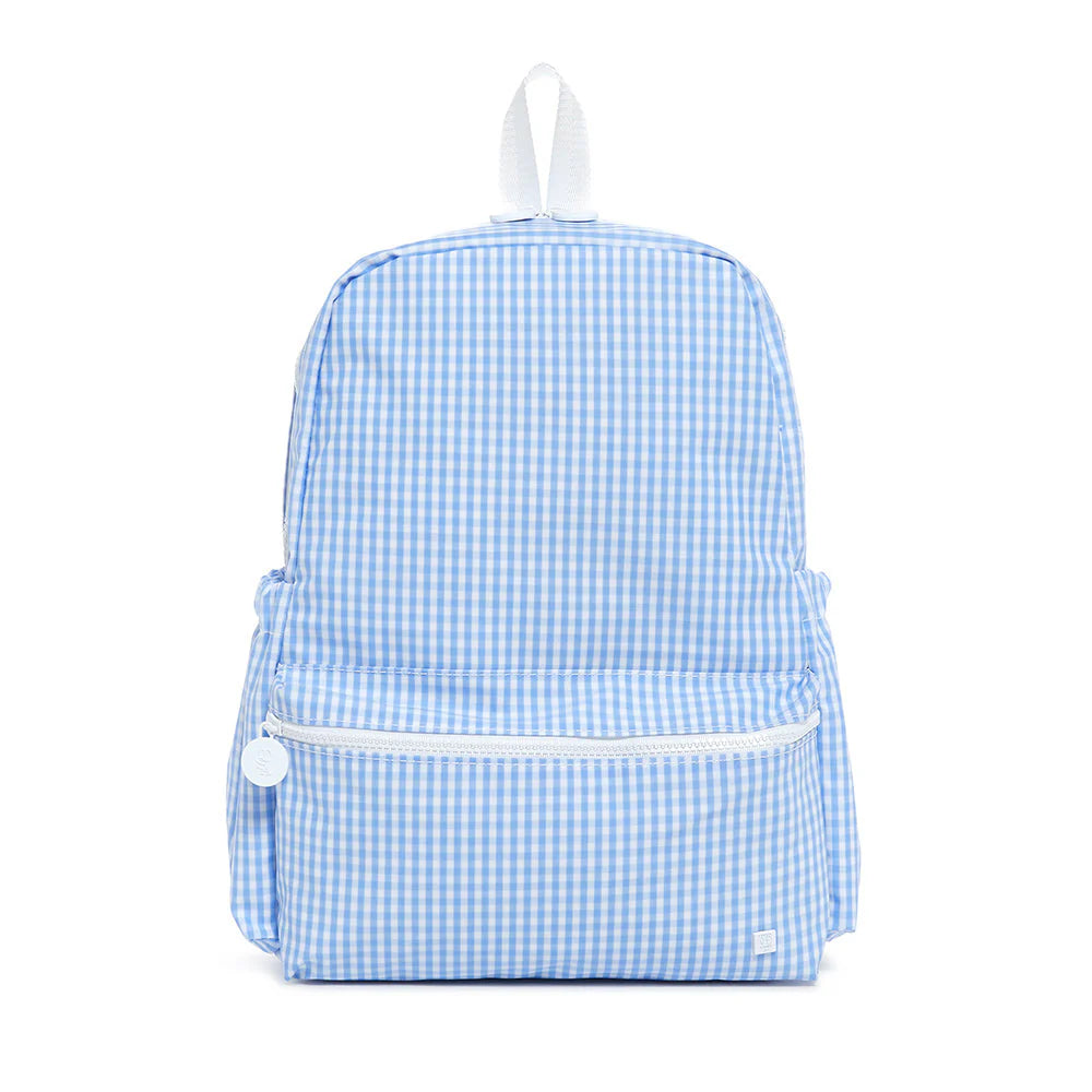 TRVL Designs TSA backpack in sky blue with multiple compartments and padded straps, suitable for travel and daily use.