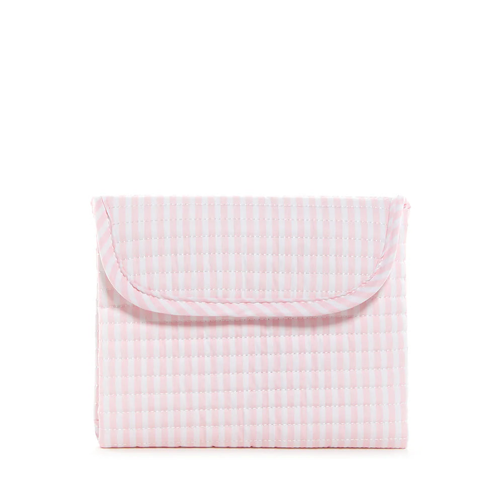 Pink quilted changing mat with Pimlico stripe pattern by TRVL Designs, featuring soft padding and secure edge for baby comfort.