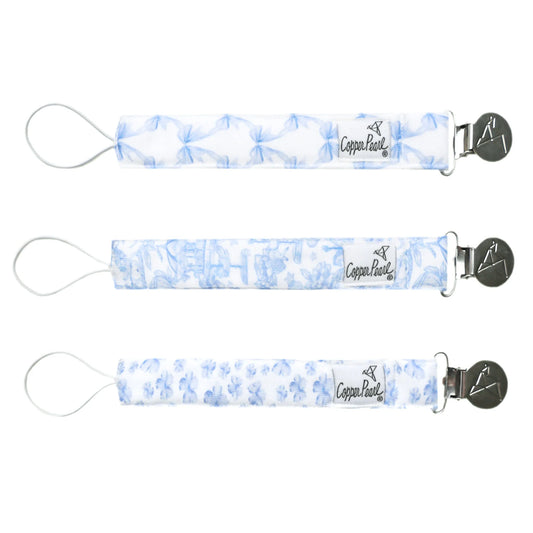 Set of vintage carnival-themed binky clips by Copper Pearl, featuring colorful and playful designs for baby accessories.