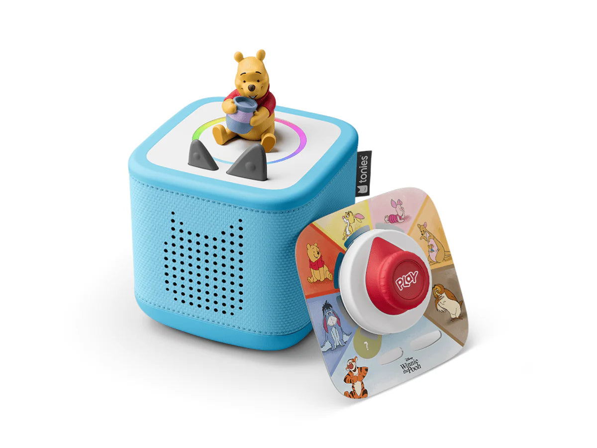 Toniebox 2 Play Set featuring Winnie the Pooh in sky blue with plush Winnie the Pooh figure and themed accessories.