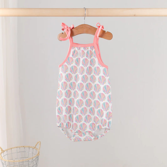 Organic cotton Shell Yeah! shoulder-tie onesie by Nola Tawk featuring a playful shell print and shoulder tie straps for babies.
