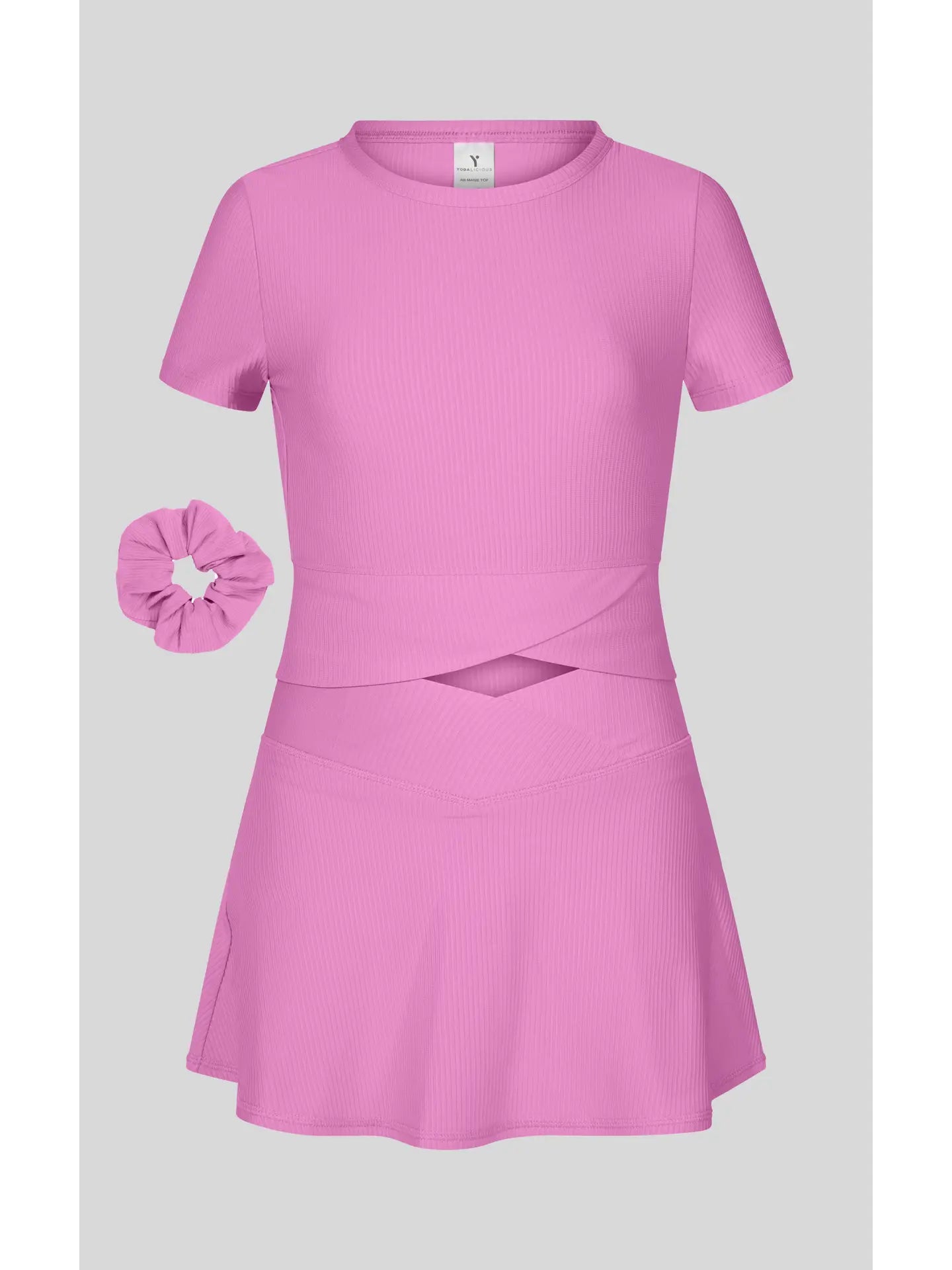 Pink Bloom Rib Marie Crossover Top and Skort Set by 90 Degree by Reflex, featuring a pink ribbed fabric top and matching skort.