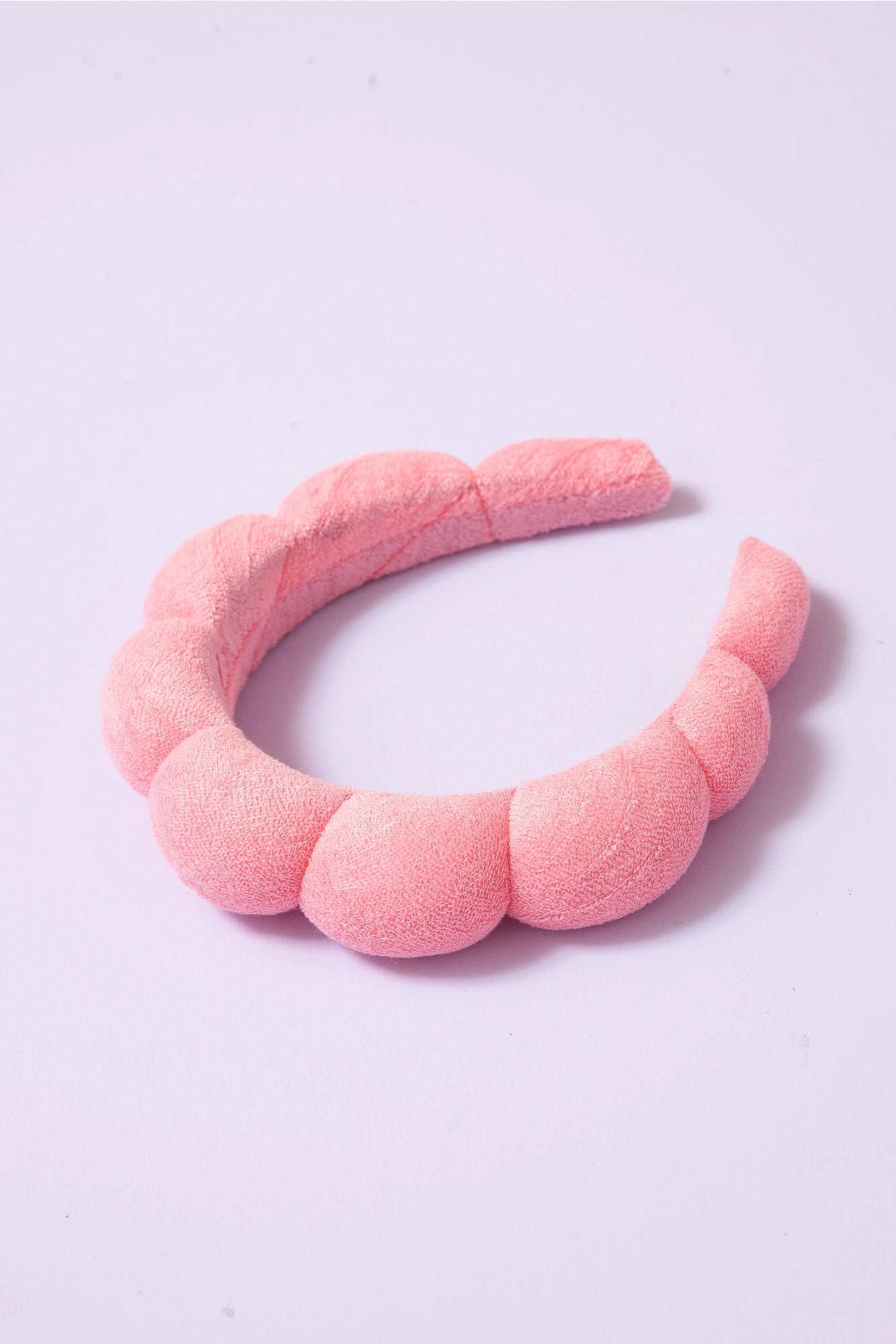 Sweet E's children's spa sponge terry towel headband for beauty care, soft fabric with a snug fit around the head for skincare use