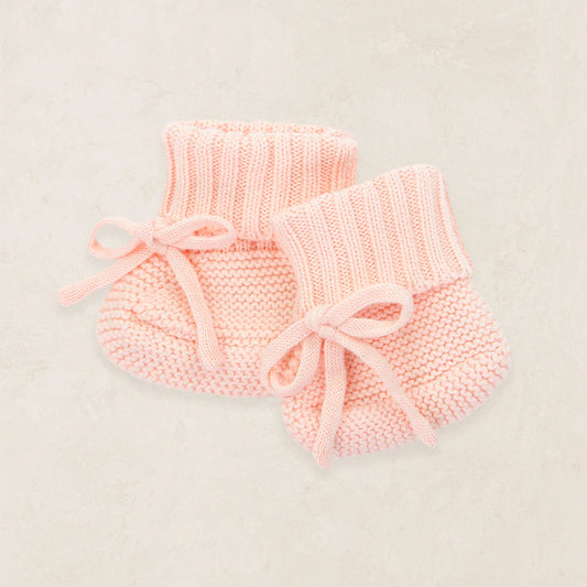 Lou Lou & Co Ballet Knit Booties in plaster color, soft knitted fabric with a cozy design for babies or toddlers.