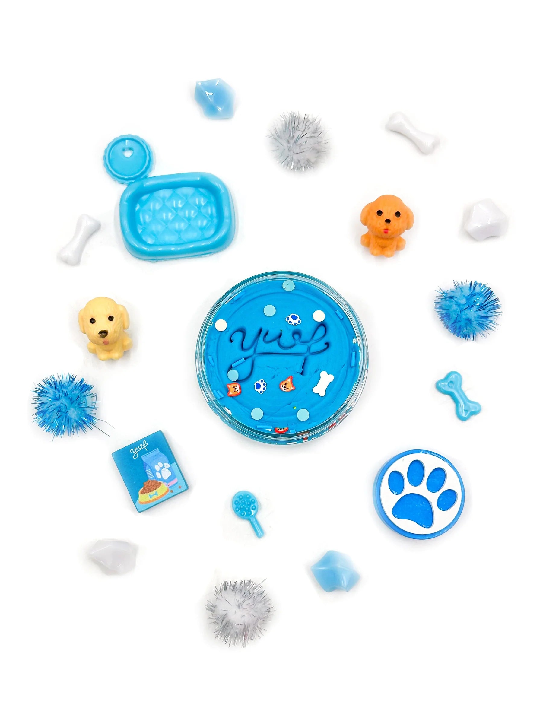 Blue Pet Shop Grab & Go Dough Jar by Young Wild and Friedman, featuring a blue container filled with colorful play dough.