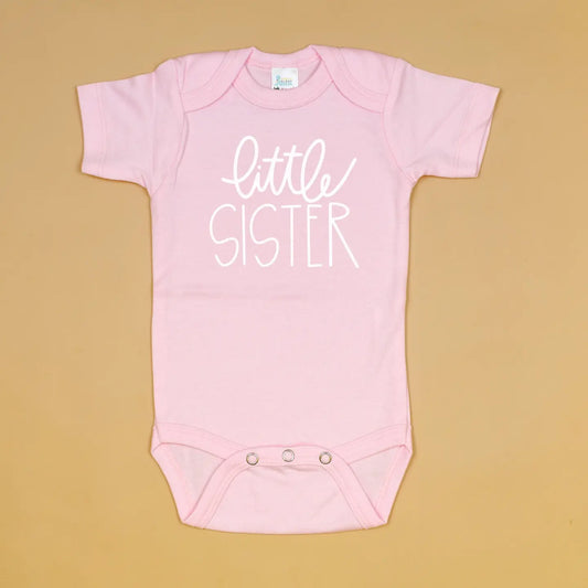 Little Sister pink onesie by Cuddle Sleep Dream, soft fabric, front snap buttons, and adorable design for infants.