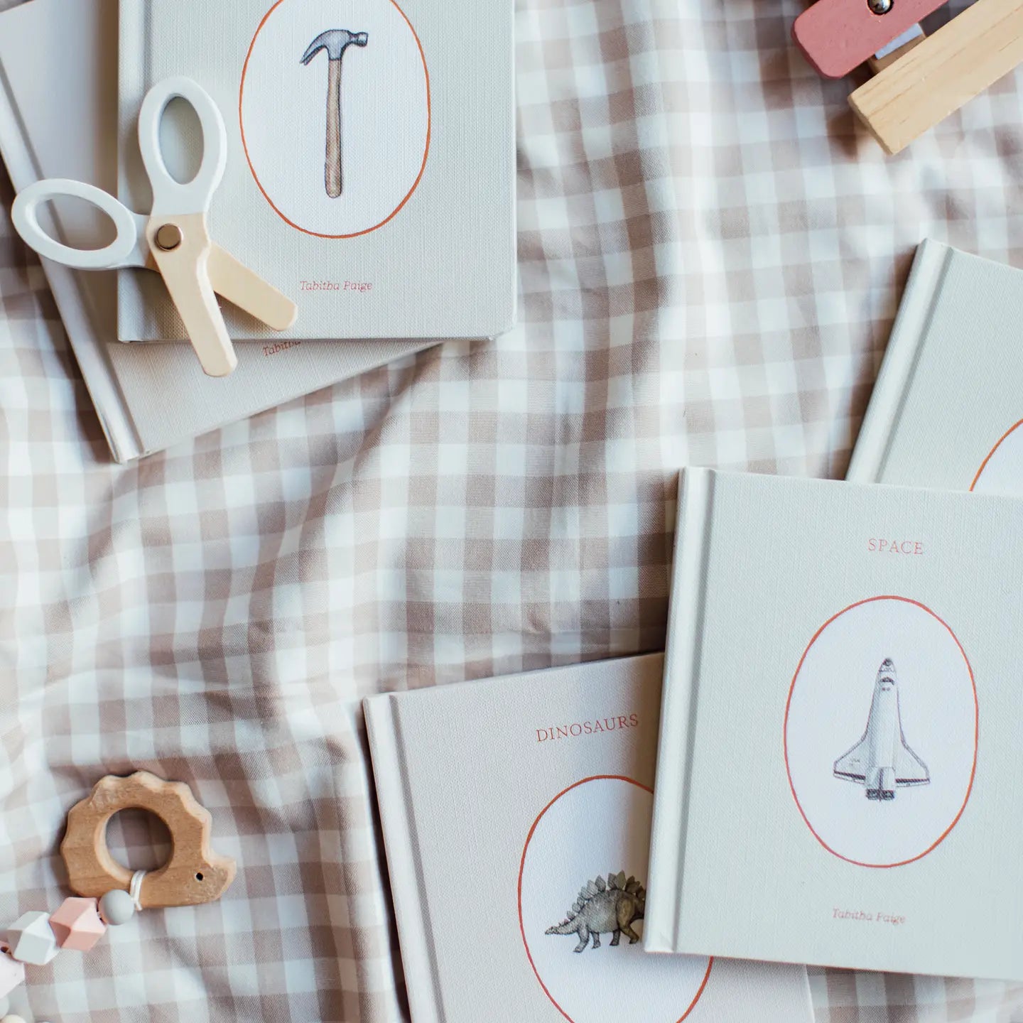 Set of five board books from Our Little Library Vol. 3 by Paige Tate & Co., featuring colorful illustrations for young children.