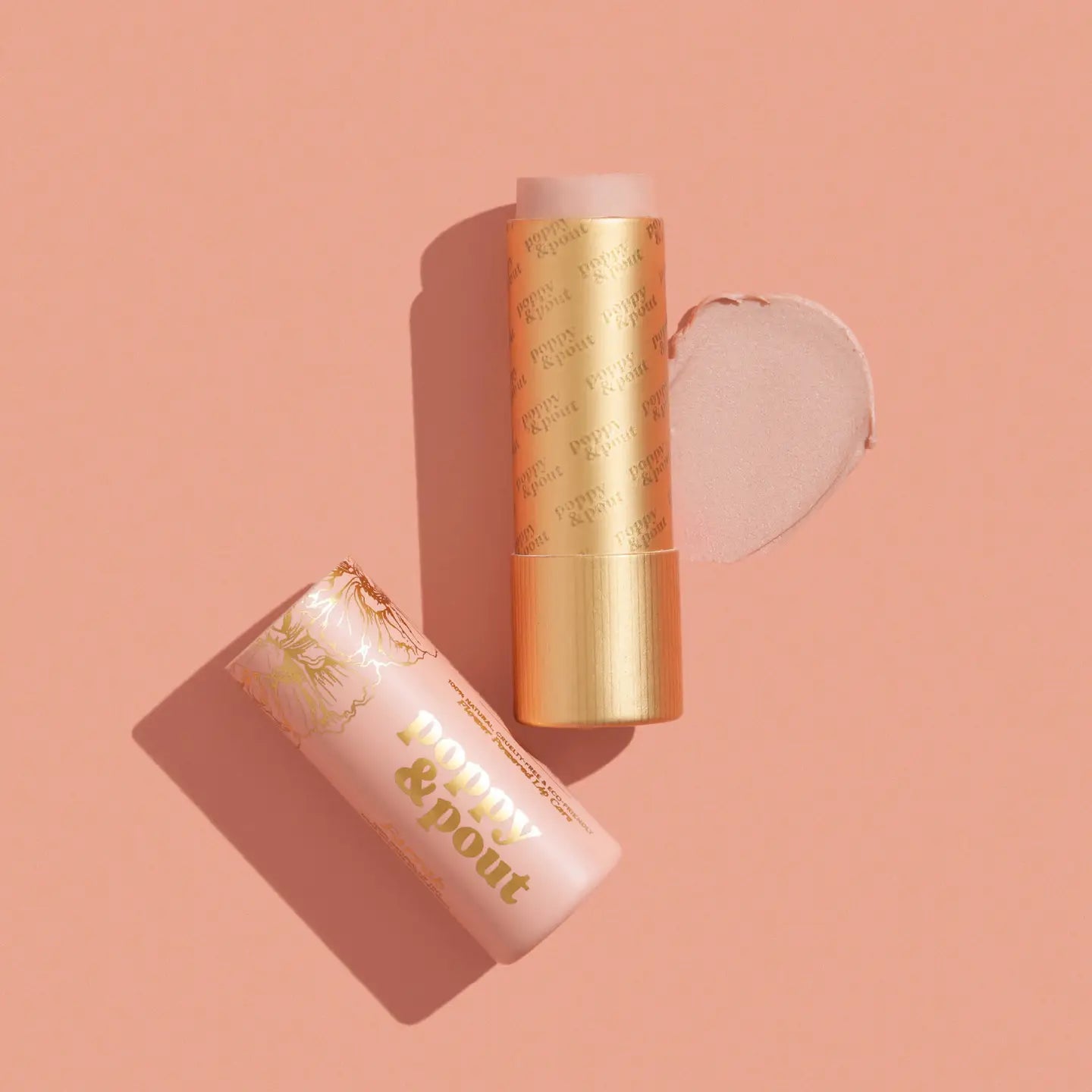 Bright pink Poppy & Pout Lip Tint from Sweet E's Children's Boutique, showcasing the vibrant, child-friendly lip color in a sleek tube.
