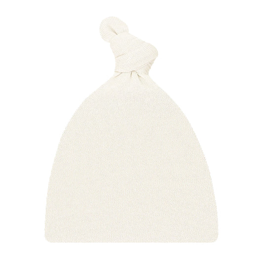 Lou Lou & Co Dakota plush knit top hat featuring soft, textured fabric and a cozy, stylish design suitable for cold weather.