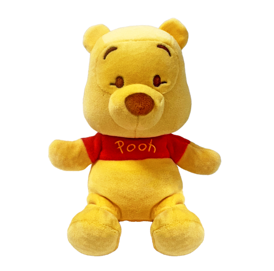 Soft Winnie the Pooh plush toy by Ty featuring classic yellow fur and red shirt, perfect for cuddling and collection.
