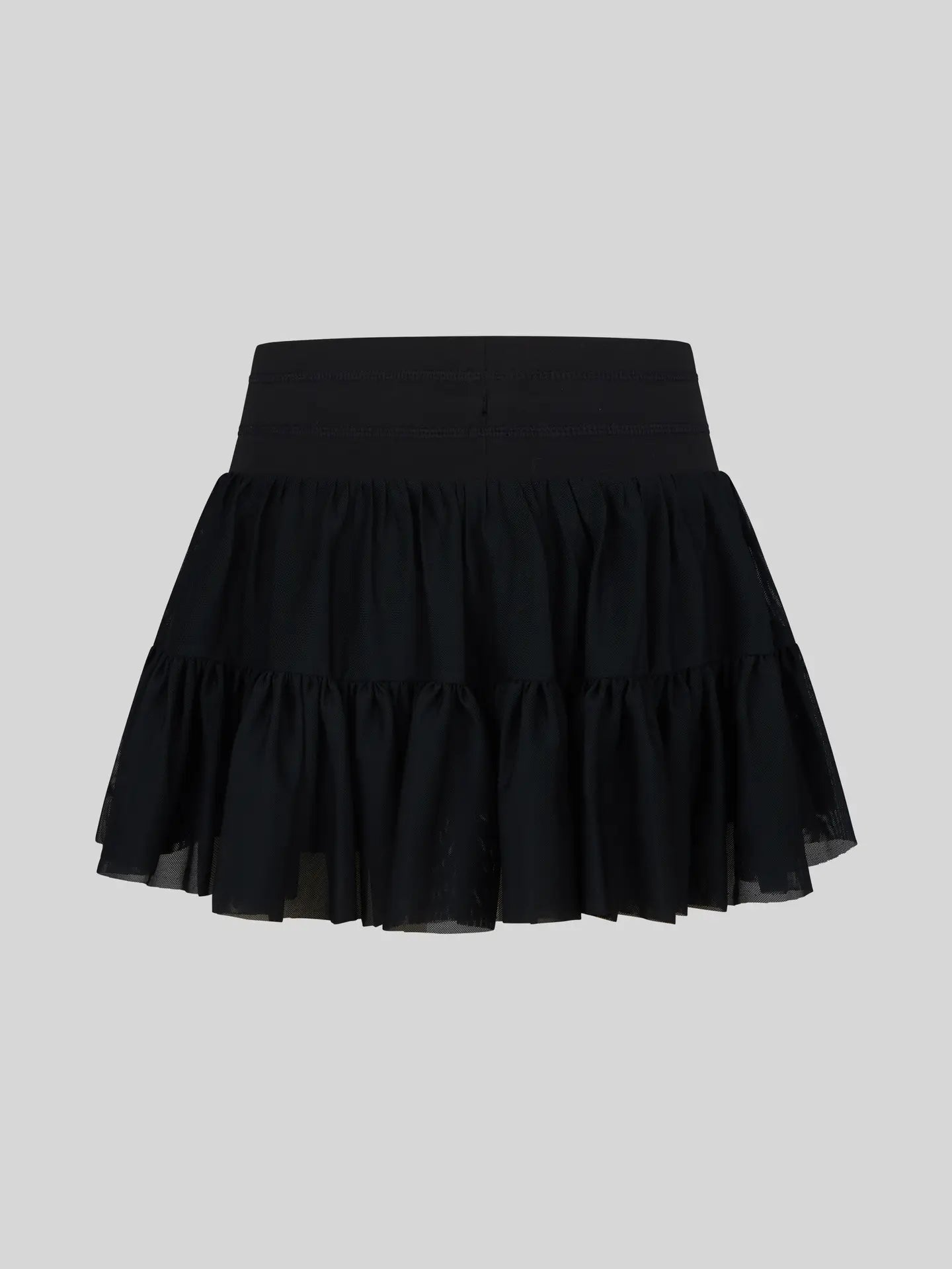 Black girls mesh double-tier ruffle skort with inner shorts by 90 Degree by Reflex, showcasing layered ruffle design and comfortable fit.