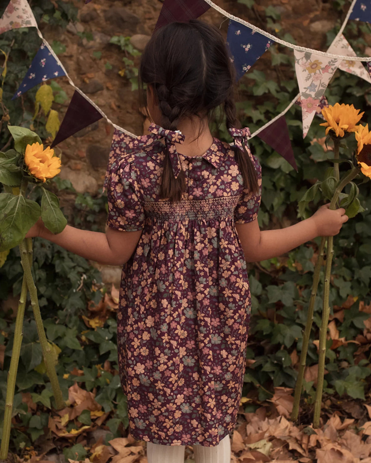 Back view of Early Sunday Garden Flowers Plum Erika Dress in printed cotton satin, showcasing its elegant floral design.