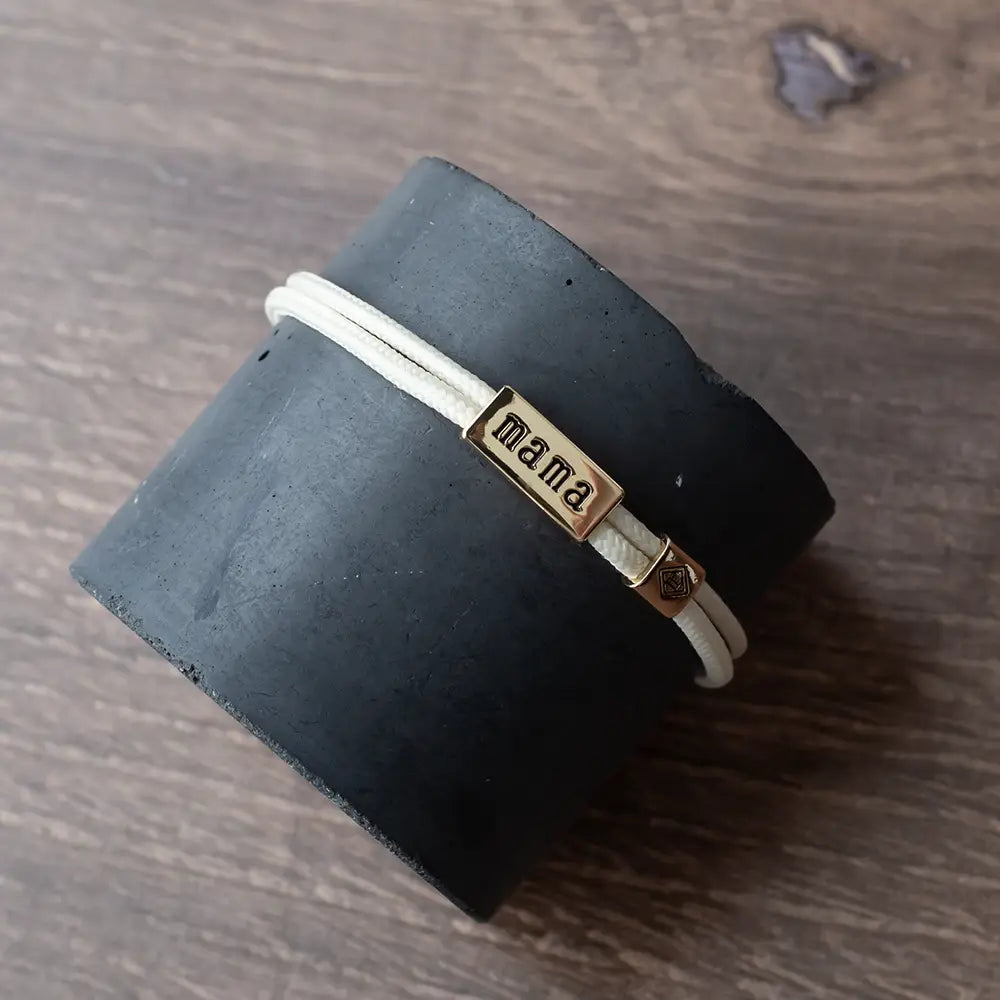 Lenny & Eva Sentiment Cord Bracelet-Mama in ivory with engraved sentiment and adjustable cord design