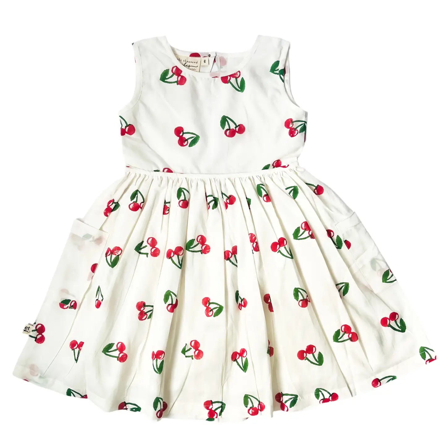 Eight Thousand Miles cherry dress with back cut-out, sleeveless design, and fitted silhouette perfect for summer occasions.