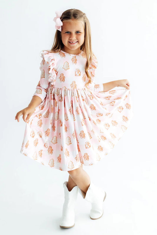 Mila & Rose Christmas Traditions 3/4 sleeve ruffle twirl dress for kids, featuring festive red and green patterns with ruffle details.
