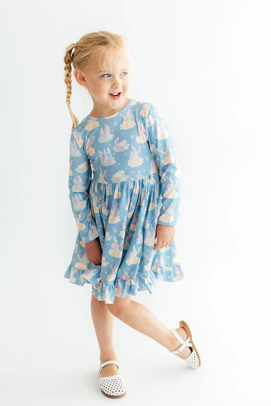 Mila & Rose Nativity long-sleeve twirl dress with ruffle hem, featuring festive holiday print and soft fabric for young children.