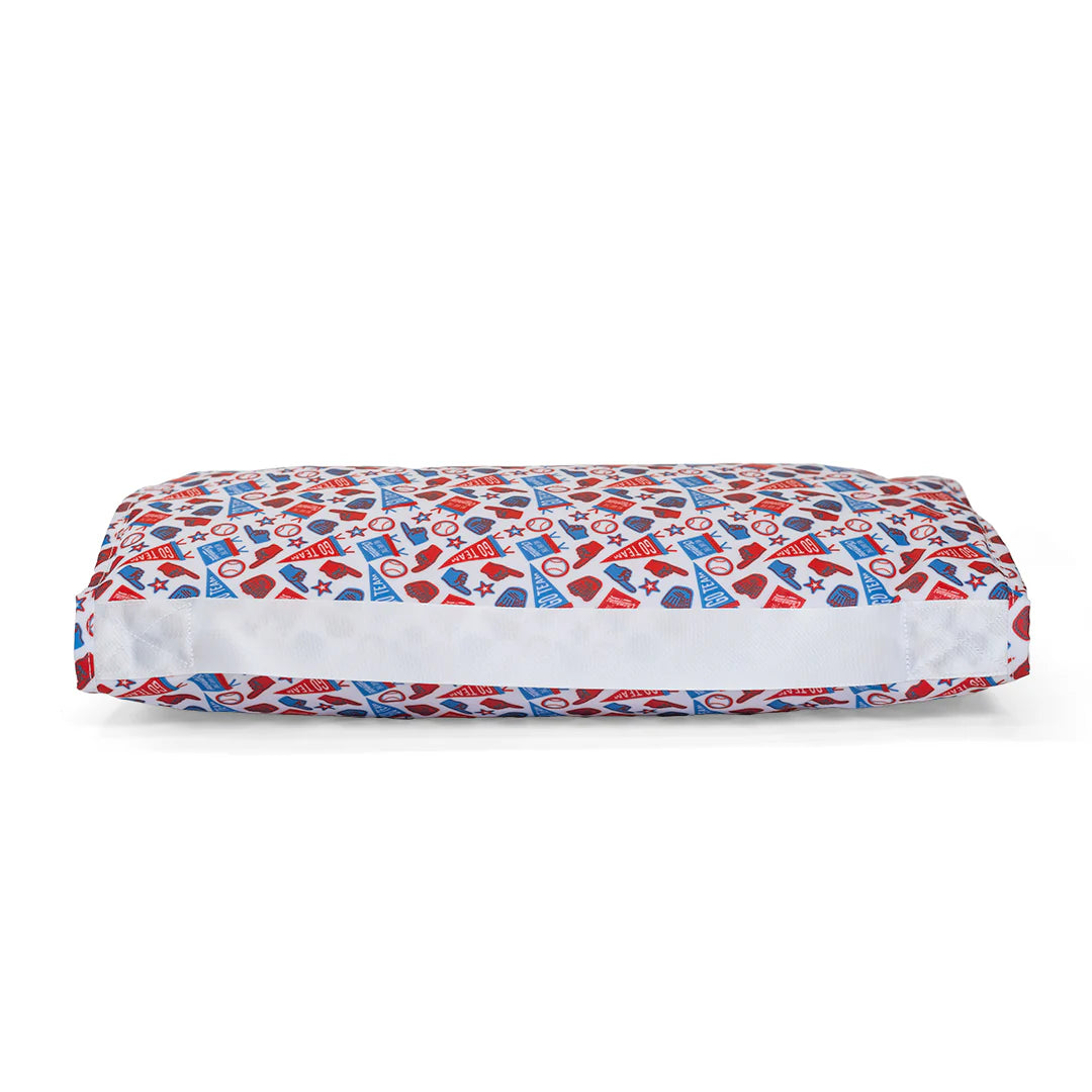 TRVL Design nap mat featuring a playful pattern with colorful play balls, perfect for children's napping and rest time.