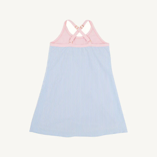 Little Miss Tennis Dress by The Beaufort Bonnet Company in blue seersucker with pink Prepletic™ pattern, back view.