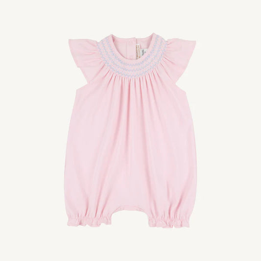 Pink and blue sandy smocked romper for babies by The Beaufort Bonnet Company, featuring Palm Beach pink and Beale Street blue details.