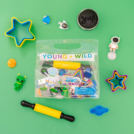 Bright blue sensory dough bag themed space with textured surface, designed for tactile play by Young Wild and Friedman.
