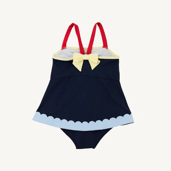 Nantucket Navy Stratford scallop swimsuit by The Beaufort Bonnet Company featuring navy, red, blue, and yellow scallop patterns.