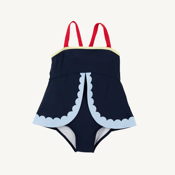 Nantucket Navy Stratford scallop swimsuit by The Beaufort Bonnet Company featuring scallop design in navy with red, blue, and yellow accents.