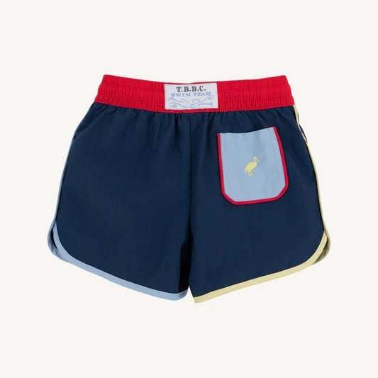 Back view of Tanner Trunks by The Beaufort Bonnet Company in Nantucket Navy, Richmond Red, Beale Street Blue, and Lake Worth Yellow.