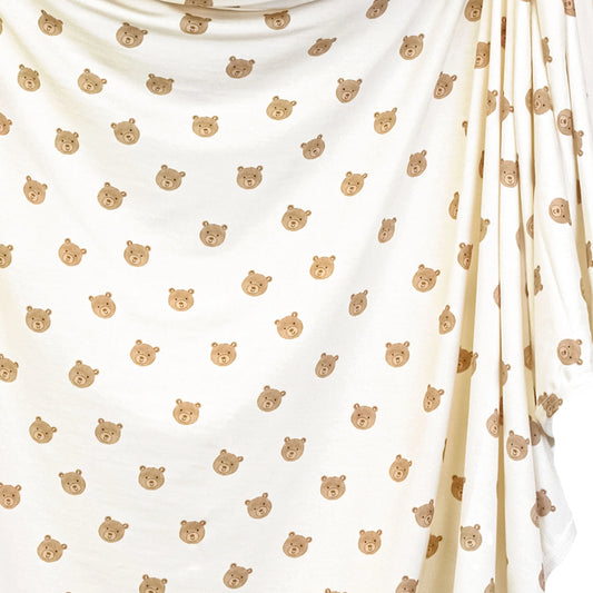 Lou Lou & Co Teddy Swaddle Blanket featuring a soft, plush teddy bear design perfect for cozy baby swaddling.