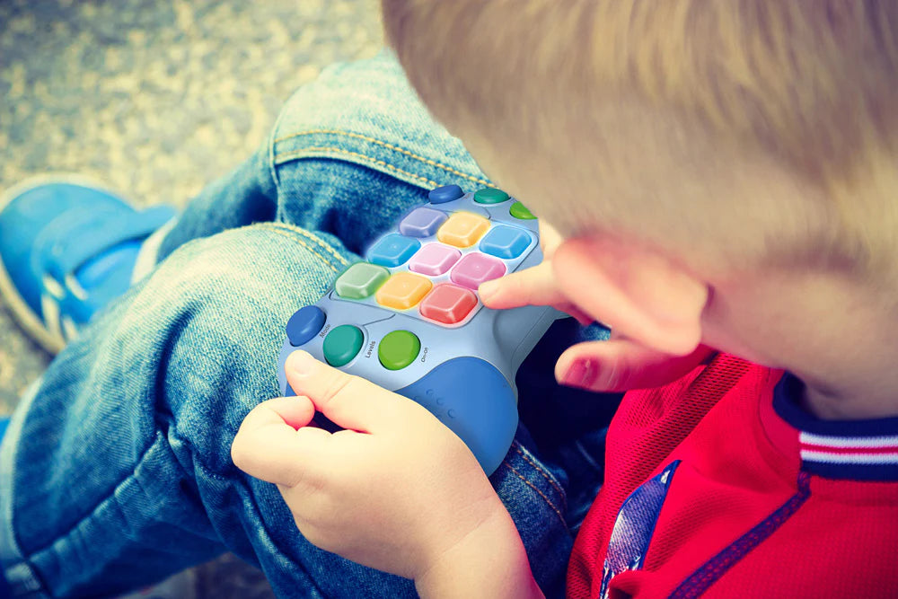 Thin Air Games Whack Attack On-the-Go game featuring a wooden mallet and colorful balls on a compact game set.