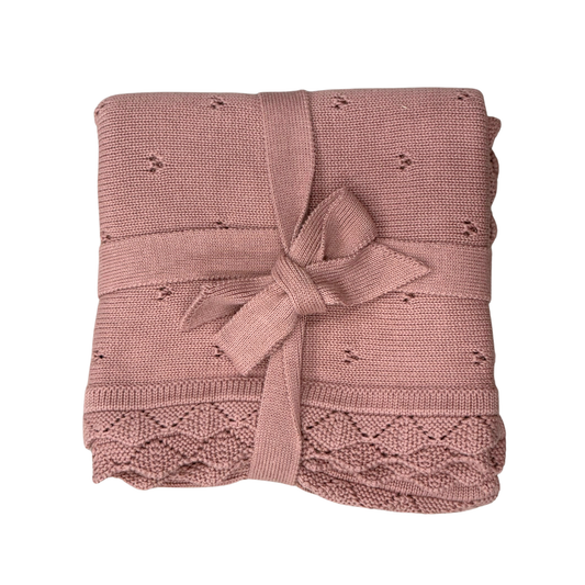 Soft pink Rose Knit Blanket by Babysprouts, featuring cozy knitted fabric perfect for baby snuggling and warmth.