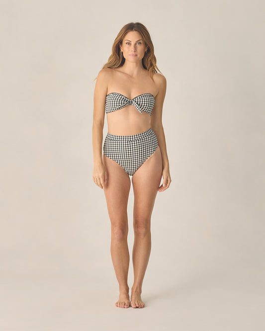Women's black gingham bandeau bikini top with knotted front by Rylee & Cru, shown on a model.