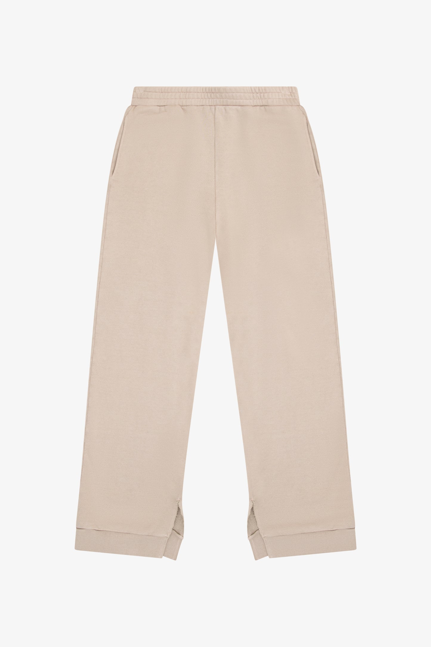 TENLY soy latte split hem pants displayed on a model, showcasing relaxed fit and stylish design with a split hem detail.
