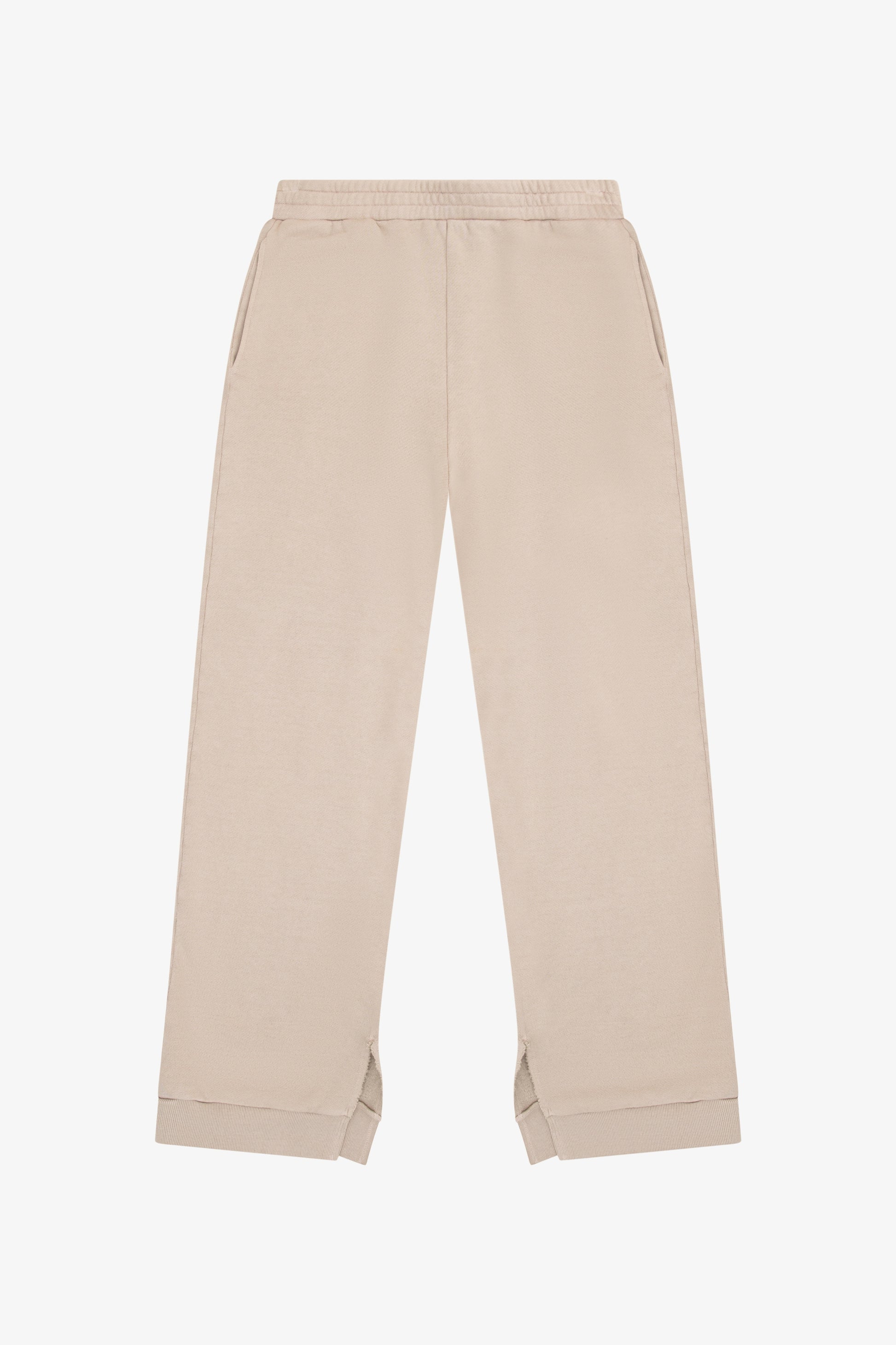 TENLY soy latte split hem pants displayed on a model, showcasing relaxed fit and stylish design with a split hem detail.