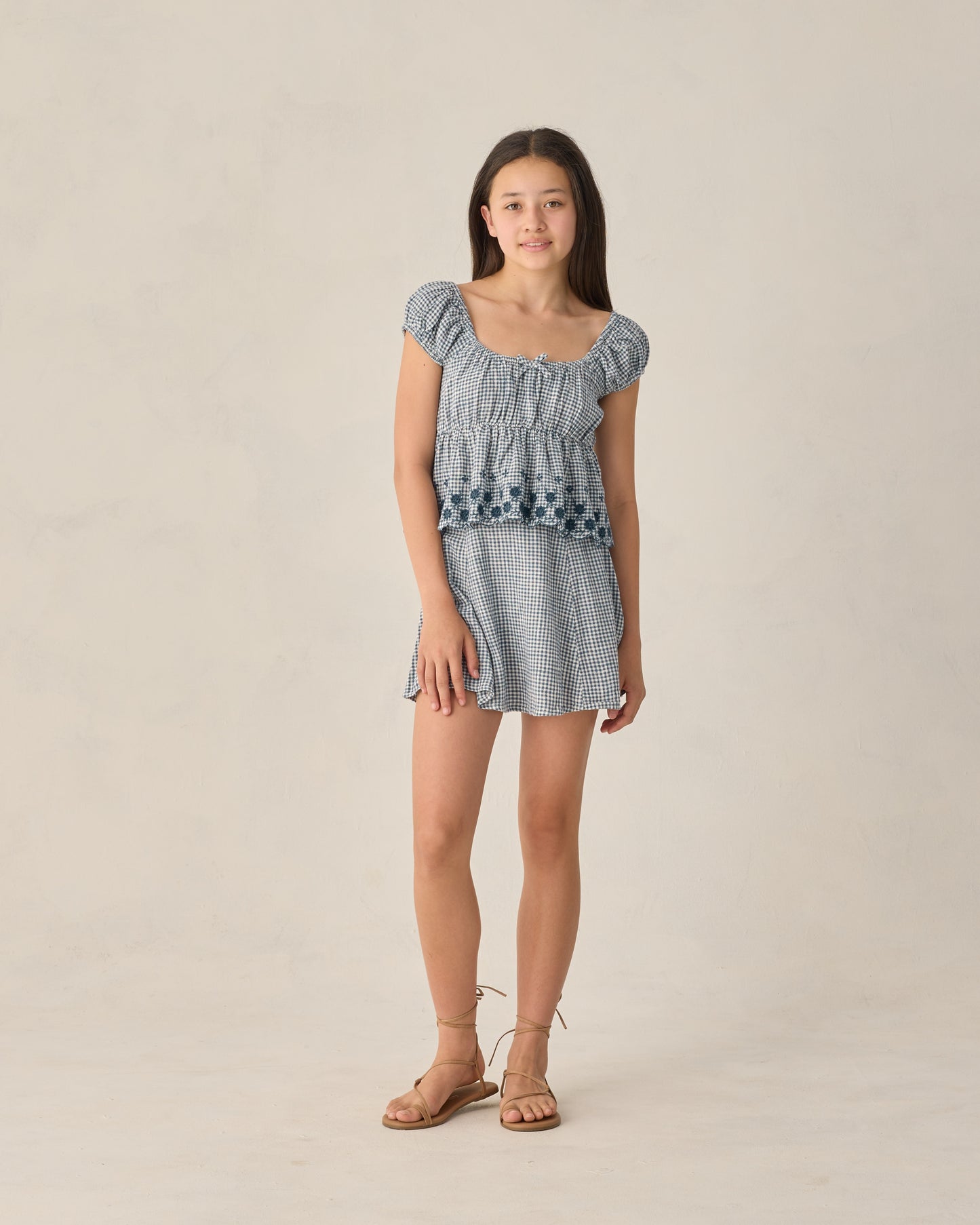 Teen Marine Gingham Rylan Top by Rylee & Cru, featuring a blue and white gingham pattern, with a close-up of the stylish youth girl's top.