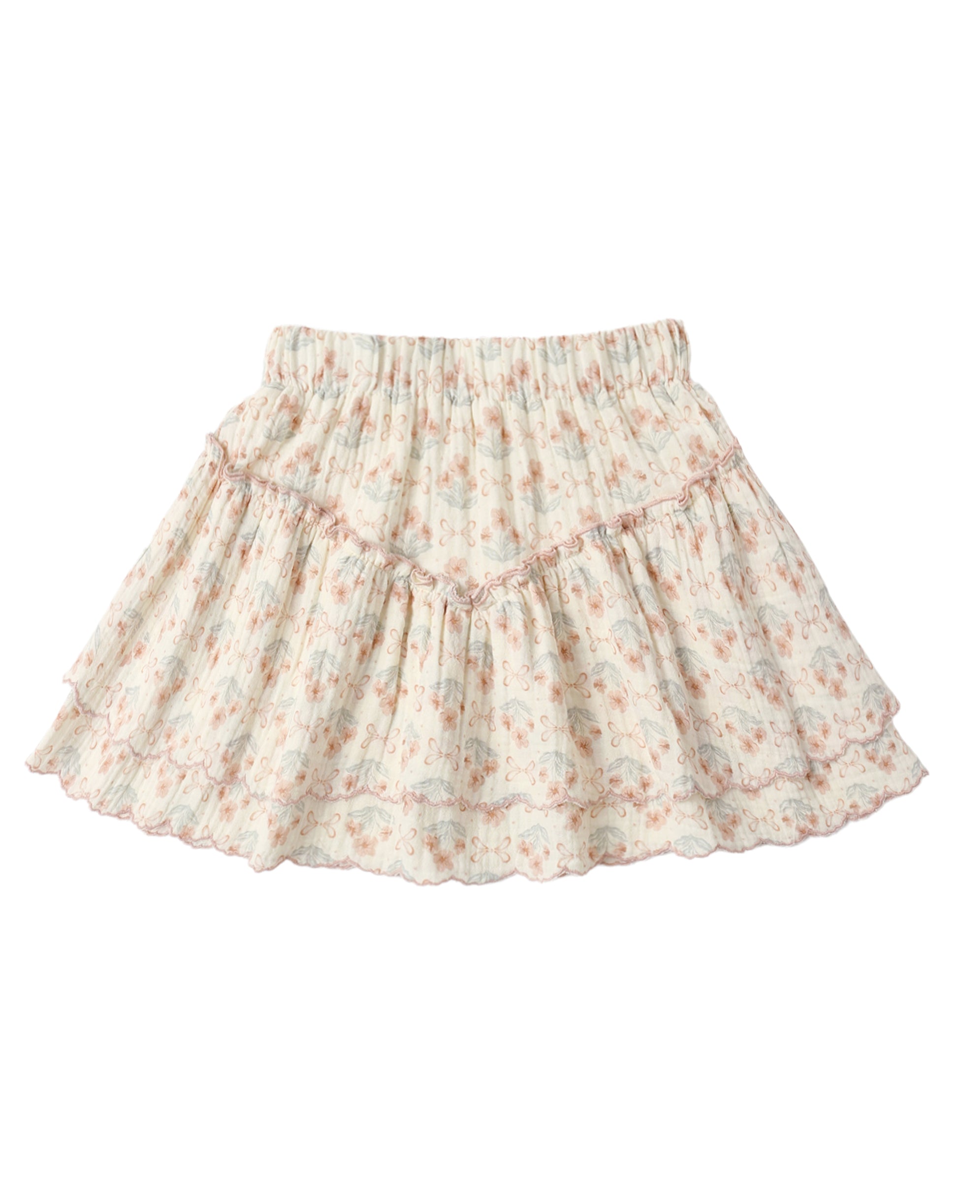 Rylee & Cru Blossom tiered mini skirt with floral pattern and ruffle layers, displayed on a hanger against a neutral background.
