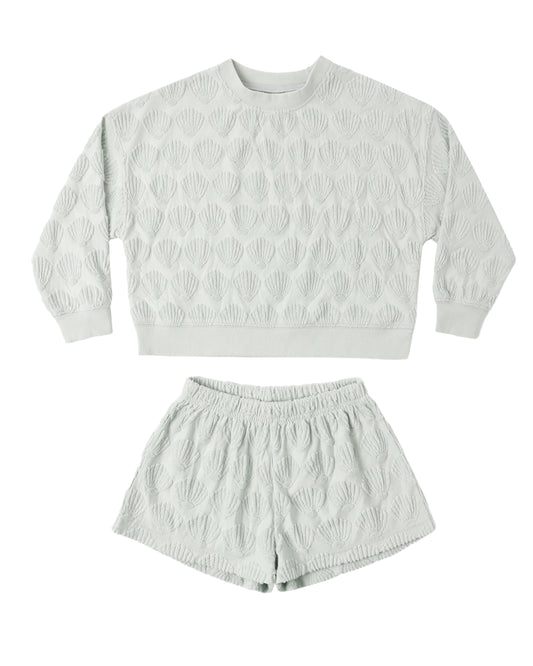 Set of seashells from the Rylee & Cru Karli collection, featuring various natural shells arranged together.