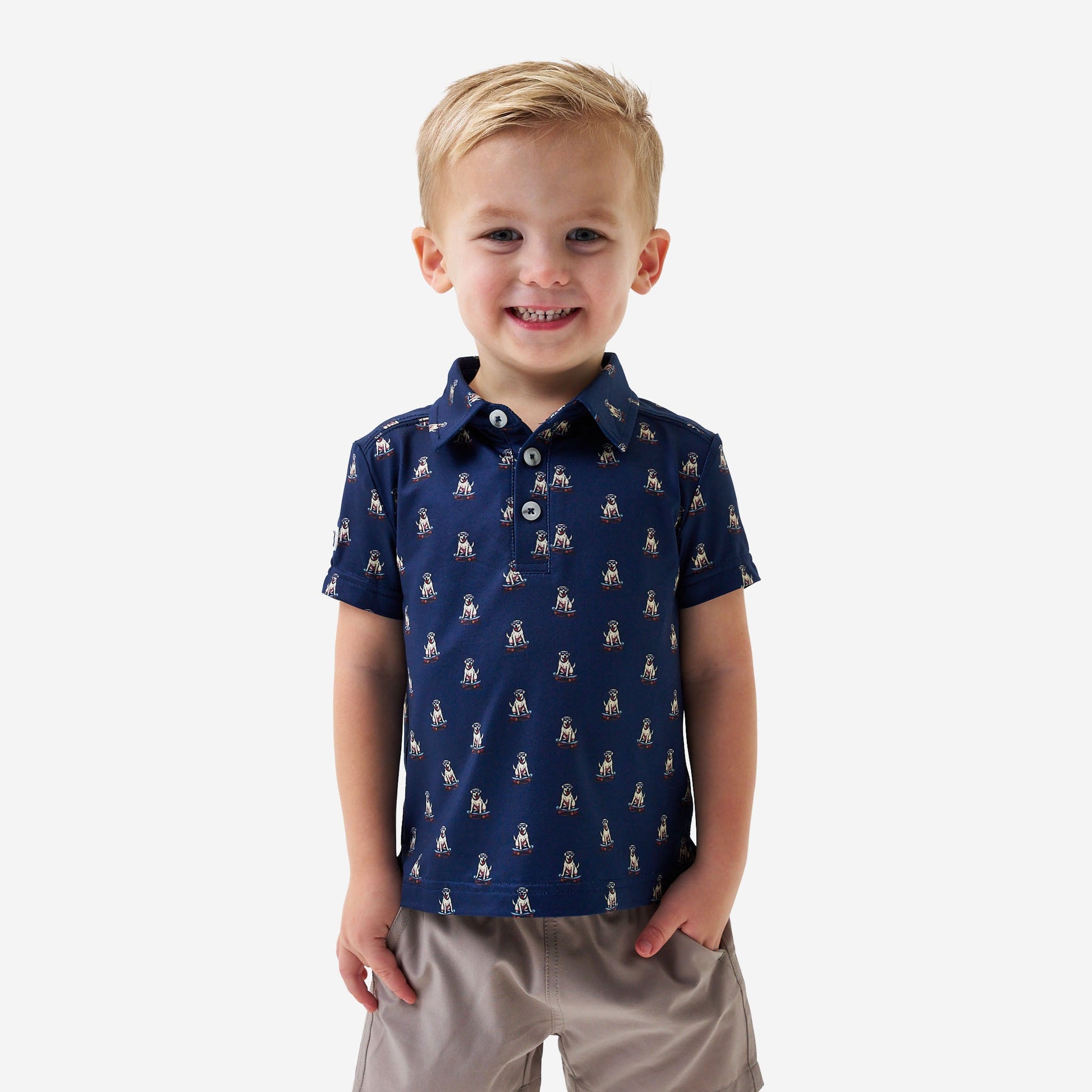 Youth skate dog polo shirt in navy by Burlebo, featuring a classic collar and short sleeves, suitable for casual wear.