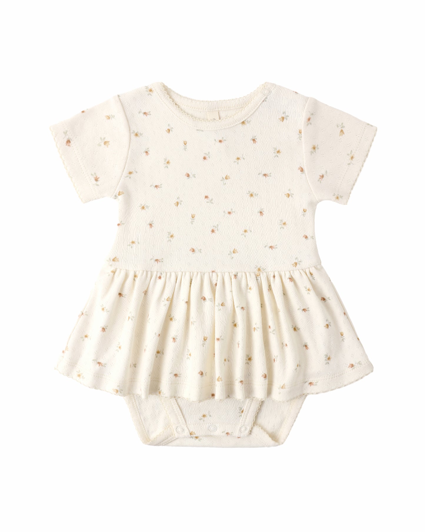 Quincy Mae Petit Fleur Pointelle Skirted Bodysuit for babies, featuring delicate knit fabric and a floral design.