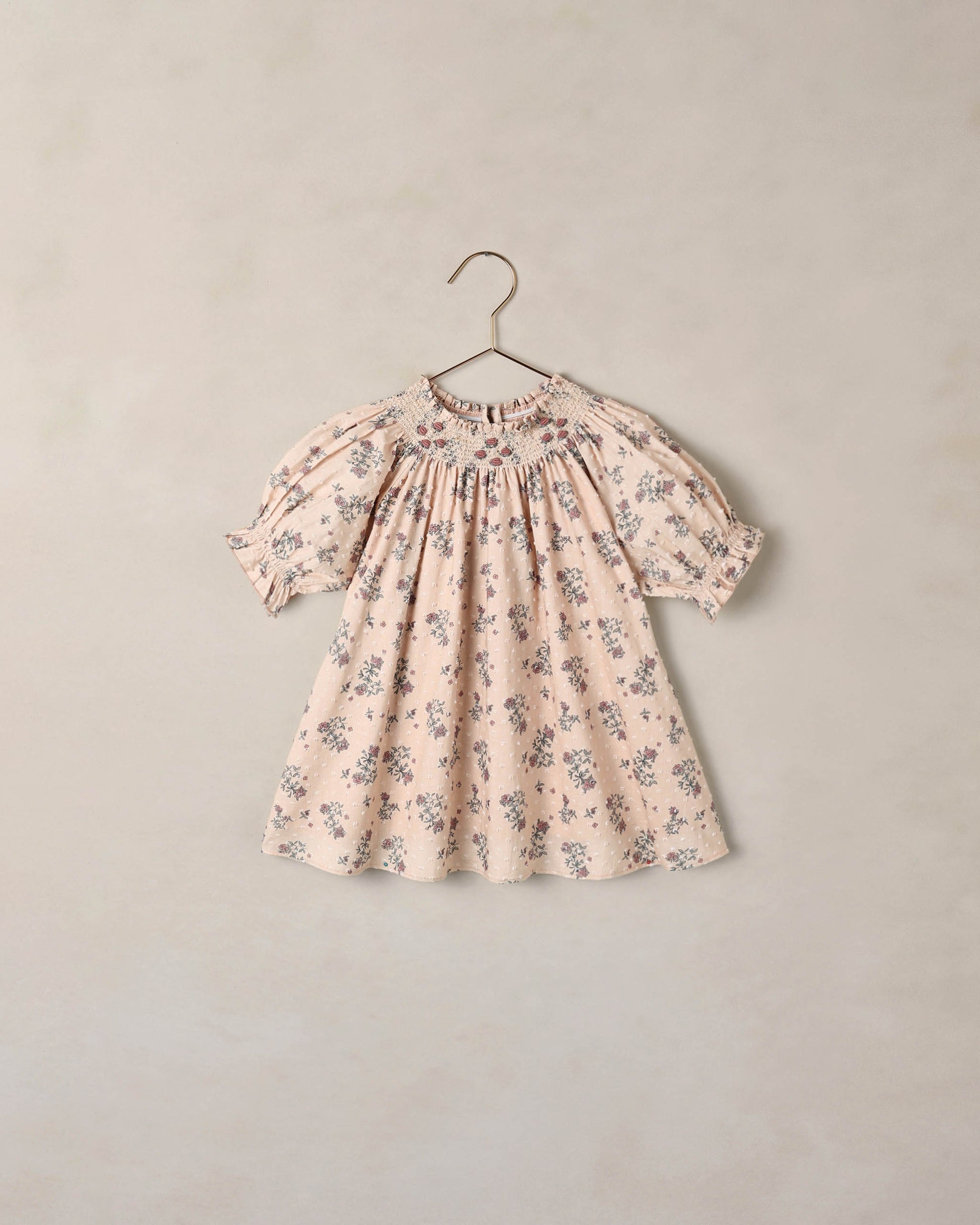Noralee French Floral Maddie Dress featuring a vibrant floral pattern and flowing fabric, perfect for summer or casual wear.