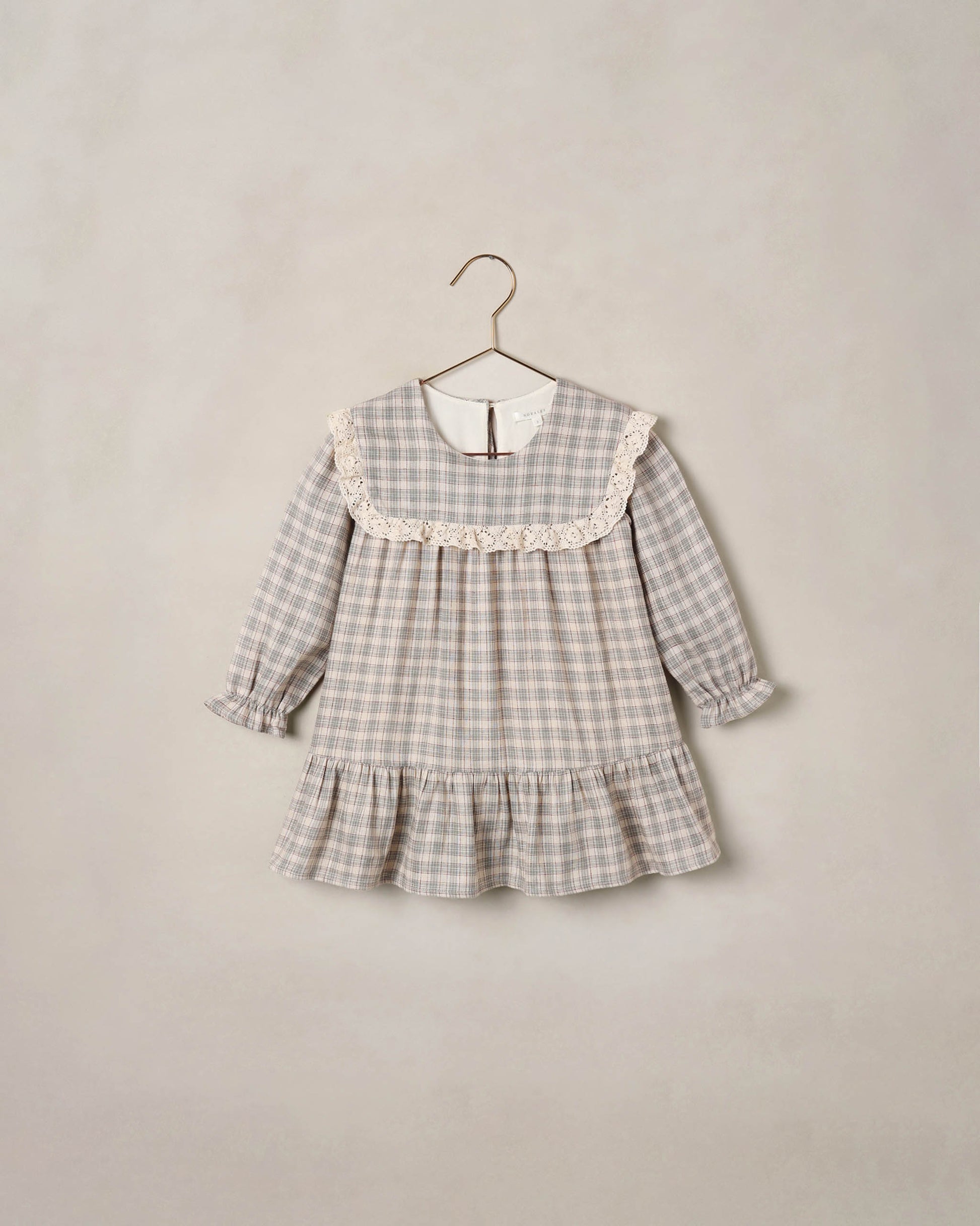 Noralee Fall Plaid Noelle Dress featuring a stylish plaid pattern and classic fit, perfect for autumn occasions.