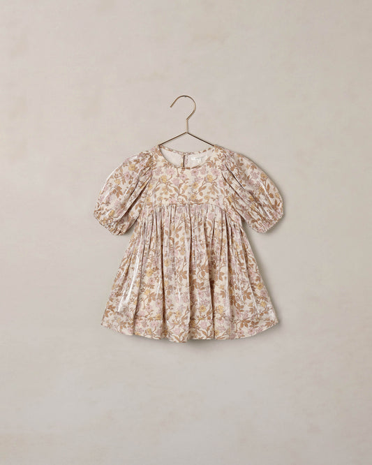 Wildflower Luna Dress by Noralee featuring a floral pattern and flowing fabric, displayed on a mannequin.
